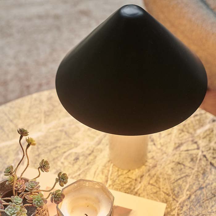 Black angular dome on table lamp.