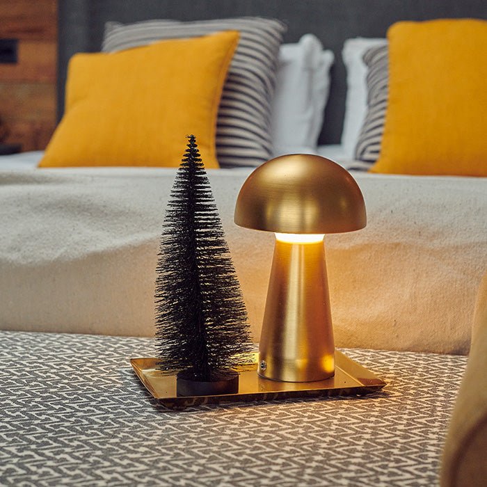 A festive decoration resembling a Christmas tree in black.