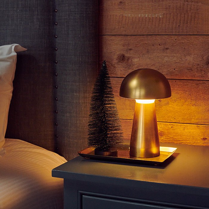 A festive decoration resembling a Christmas tree in black.