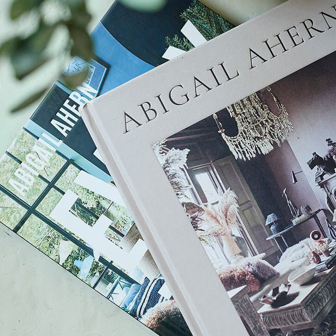 Close up of two hardback books by Abigail Ahern with images of her interiors.