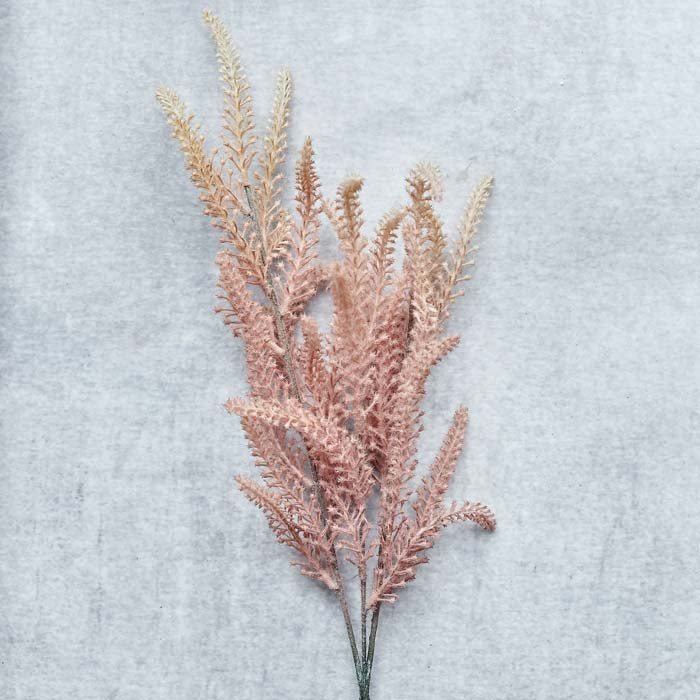 A single stem of artificial foxtail in a soft pink colour.