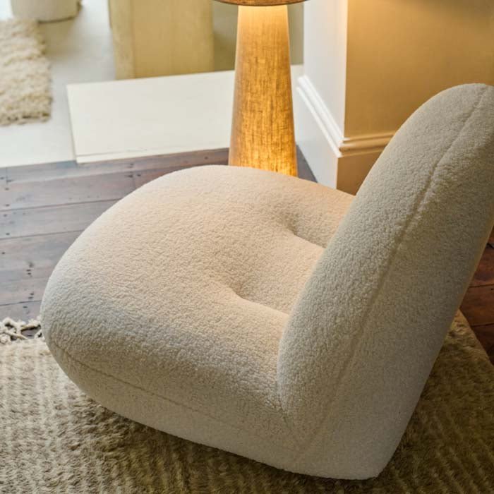 Faroe boucle chair cream rounded organic shape gold base modern luxury living room furniture styled