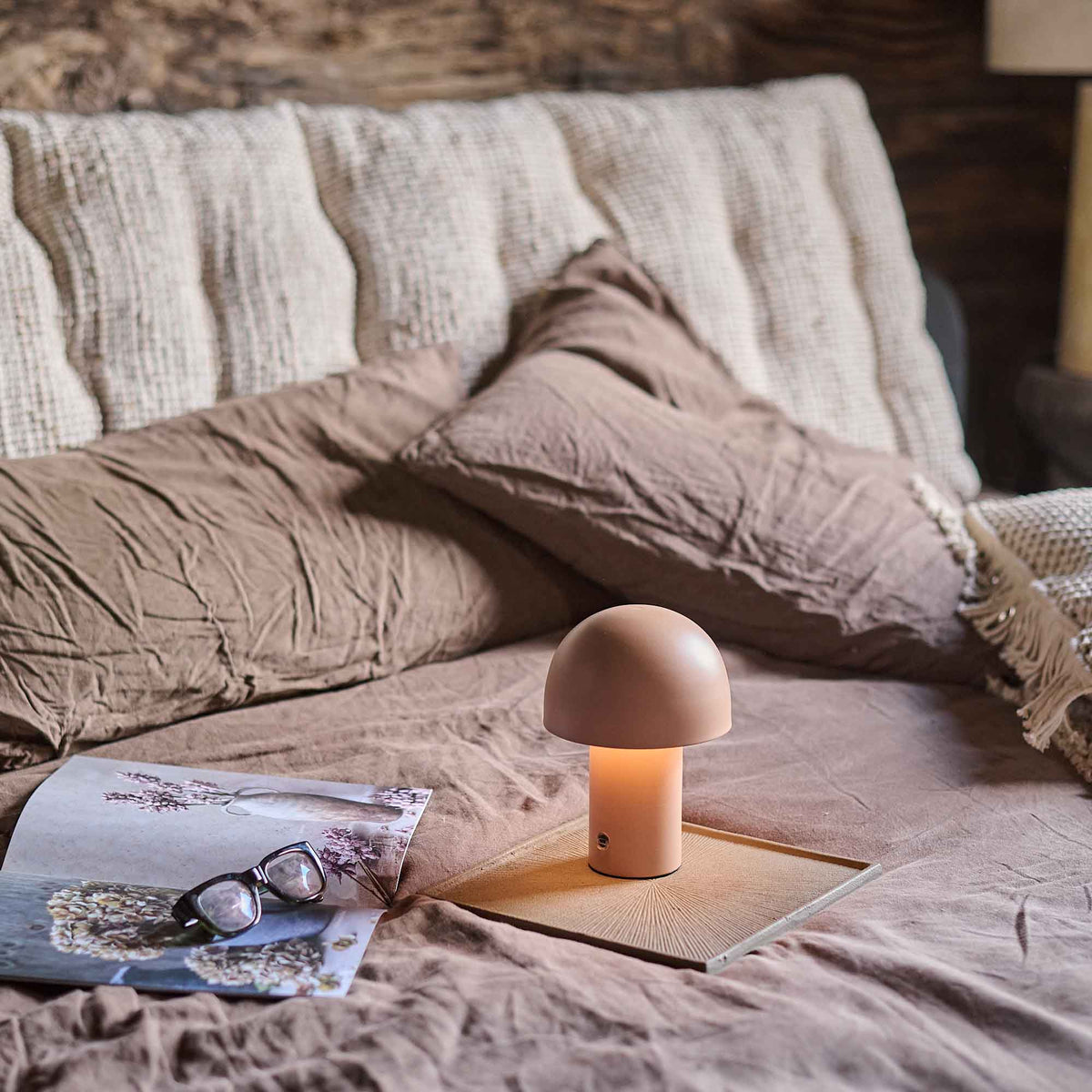 Alton Portable Table Lamp - a small mushroom lamp made from metal that's cordless.