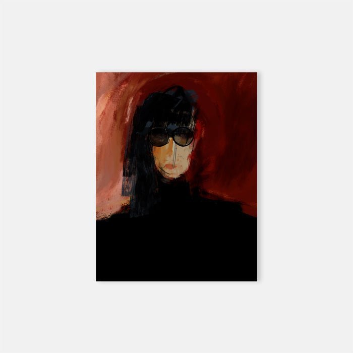 Ada, a stylish female portrait with long dark hair and sunglasses against a vibrant red background.