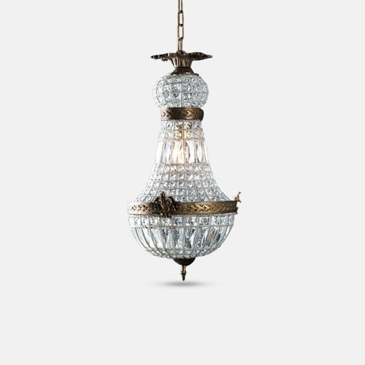 Small ballroom chandelier with clear glass beads and bronze metal frame.