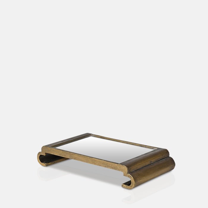 A cutout of the Bletchley Mirrored Tray, a rectangular tray with a curved pedestal base.