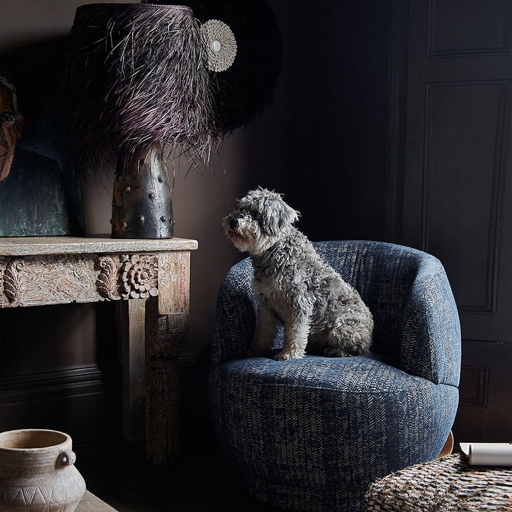 An armchair in gorgeous textured navy blue herringbone pattern fabric and retro curved round shape, this Abigail Ahern Elliot Blue Curved Armchair is the perfect accent chair for any space, oozing elegance and style. Place in your living room, home office, bedroom or create a cosy reading corner to sit back and unwind. luxury dog bed