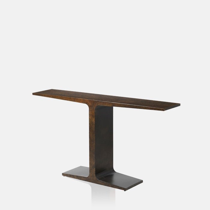 A cutout of the Harrow Console, with a sculptural t-shape in a burnished iron finish, shown from an angle.