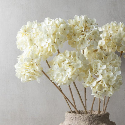 Closer image of soft, cream colour faux Hydrangeas. Combine with more hydrangeas or other artificial botanicals to create a gorgeous indoor bouquet.