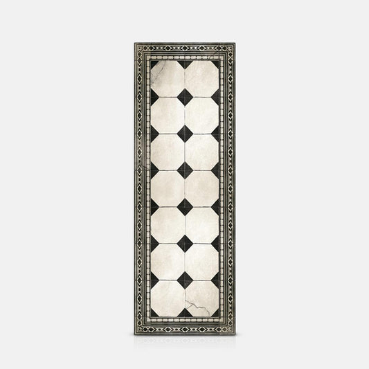 Black and white tiled pattern with a decorative edge on a long vinyl runner