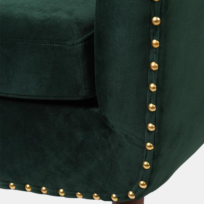 A closeup of the gold studding on the Jermyn Chair.