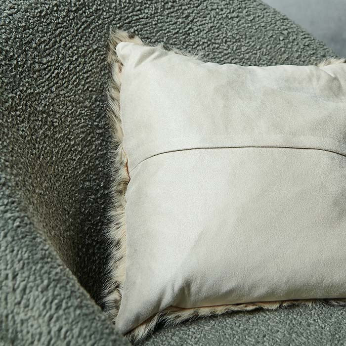 A closeup of the plain back of the Kampala Leopard Print Cushion.