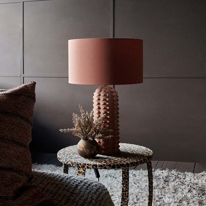 Maynard Table, a coral hued linen shade and a bubble textural ceramic base table lamp styled on a leopard print side table.
