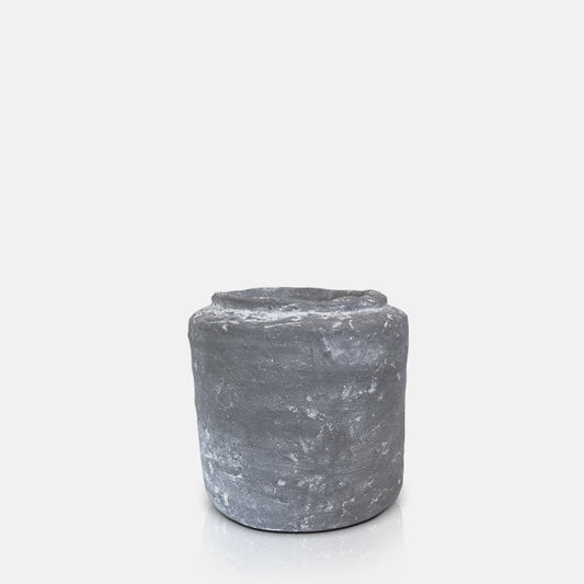 Small grey cement vase with boxy curved design and rustic finish.