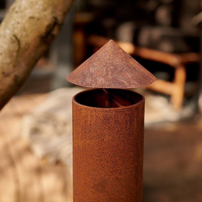 A closeup showing the chimney of the Sierra Chiminea Log Burner - Rust.