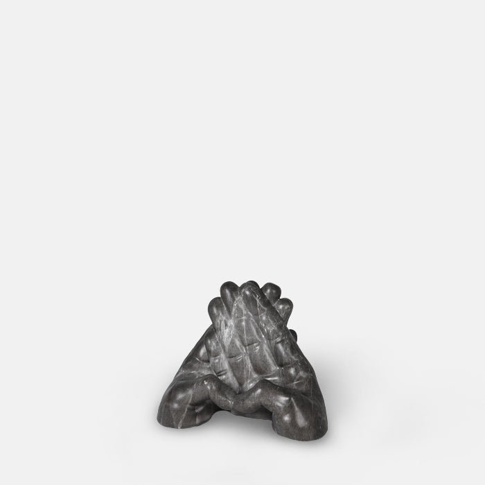 A cutout of the Stony Phone Holder, a grey faux marble phone holder in the shape of two hands.
