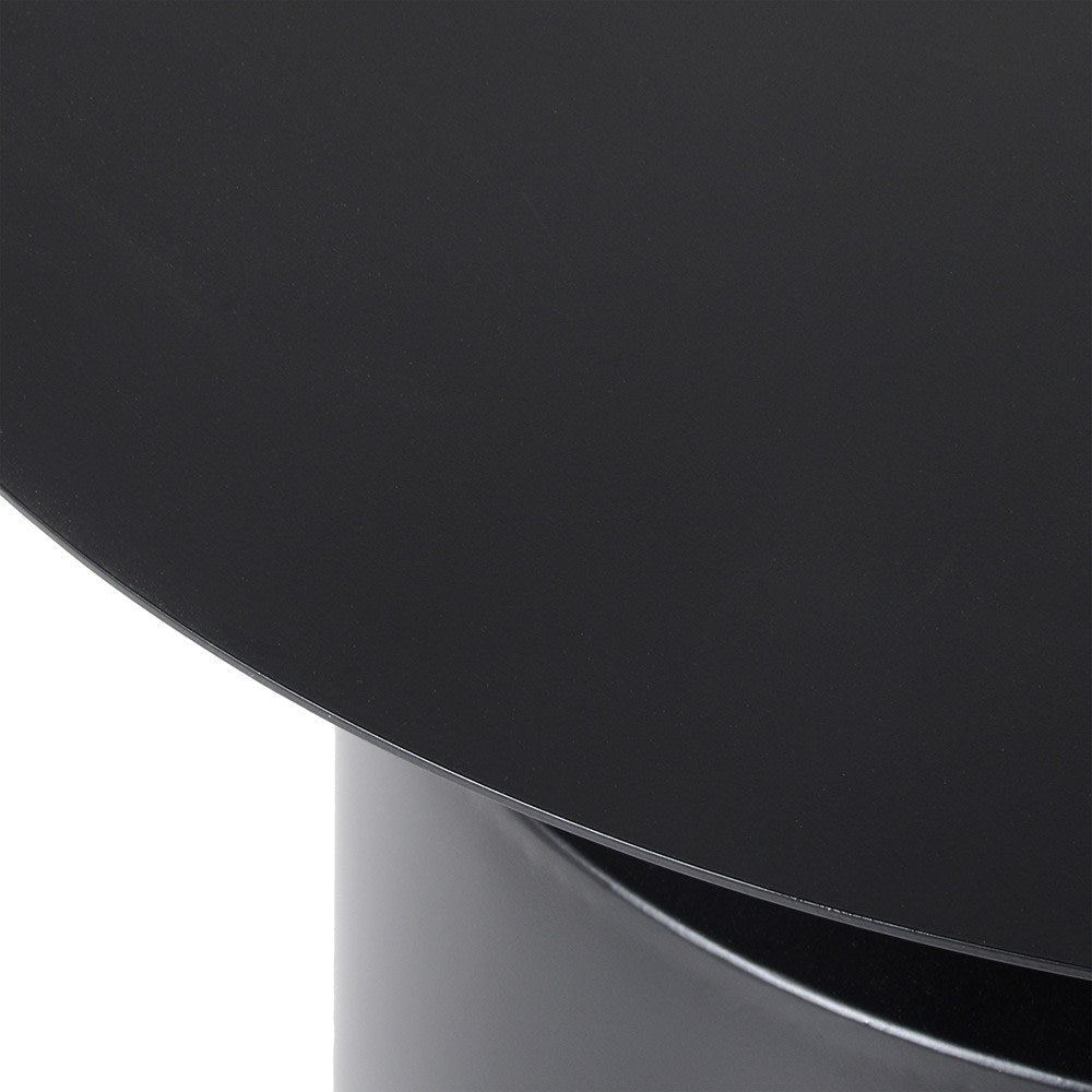 Close-up of the Abigail Ahern Denholm Iron Coffee Table highlighting its raw but smooth dark black finish, tactile texture and understated industrial character.