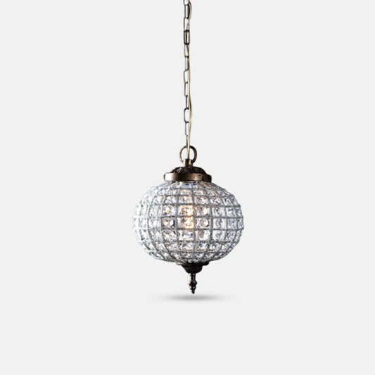 Small round chandelier with bronzed metal frame and clear glass beads.