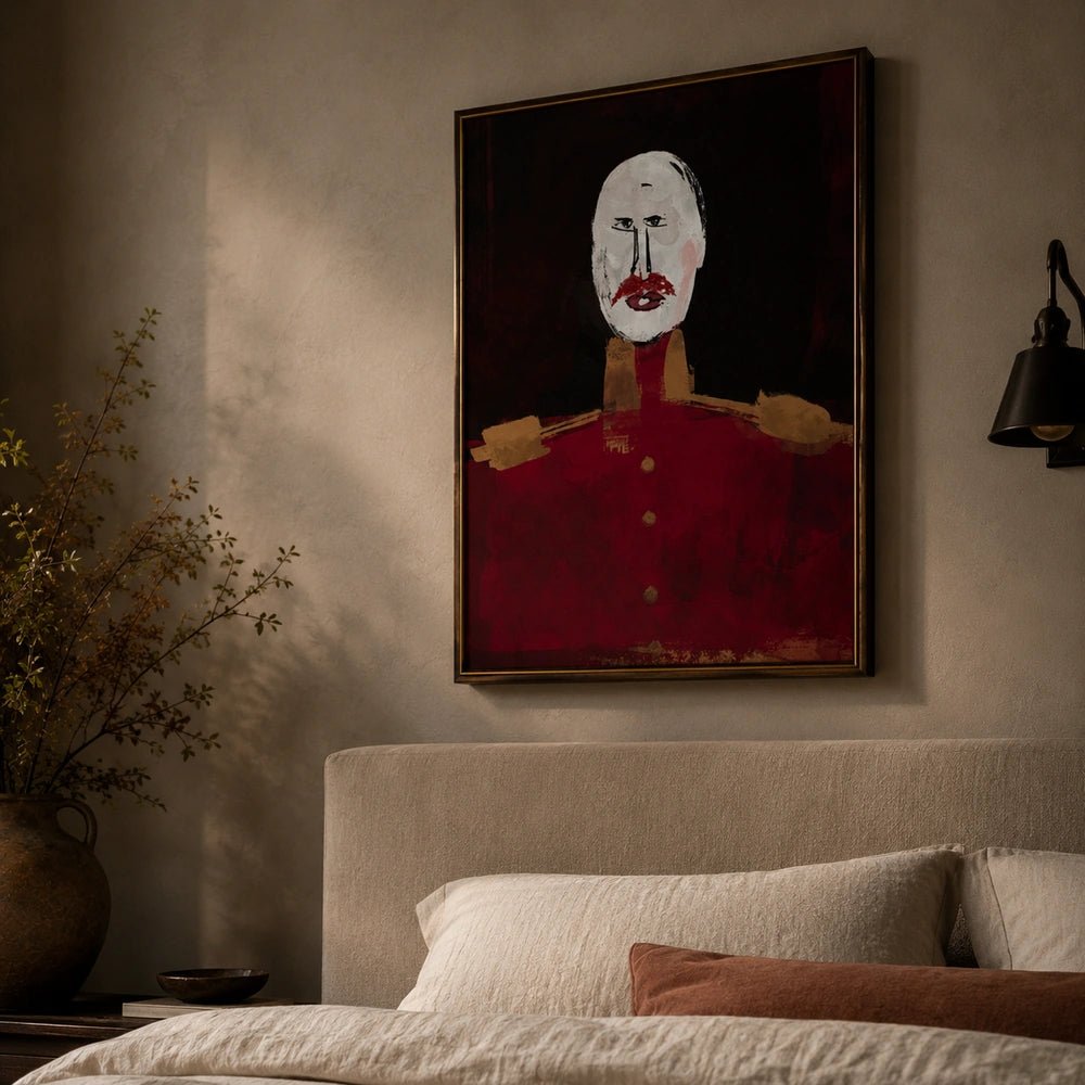 Valour figurative artwork shown closer in a dark frame, featuring a pale expressive face and vivid red clothing above a softly styled neutral bed.