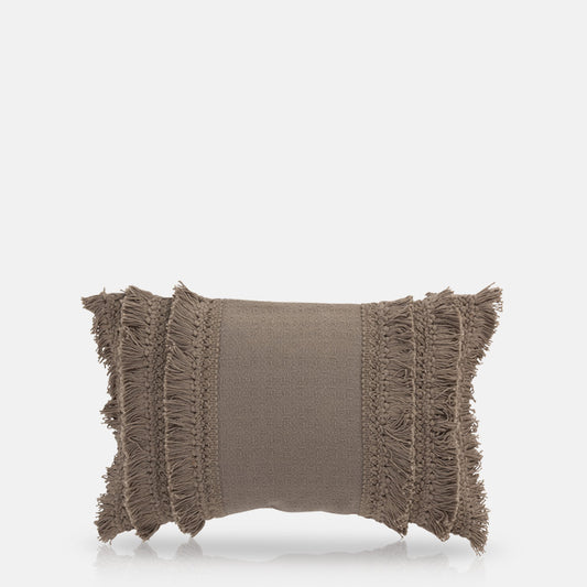 A cutout picture of a rectangle shaped cushion with fringing and a zip on the back.