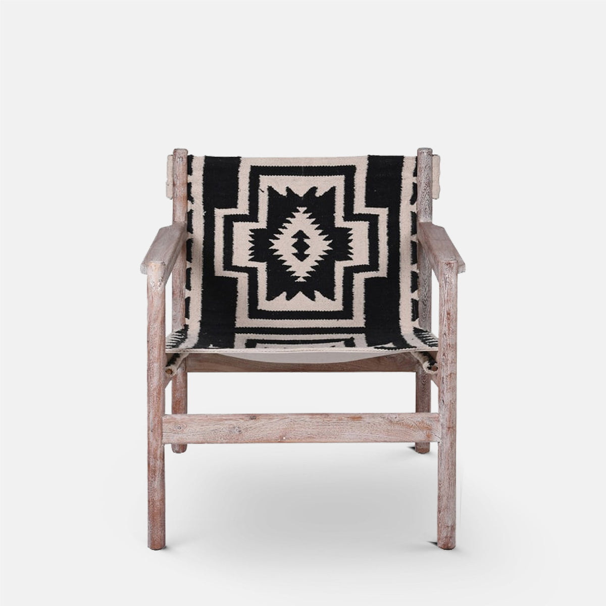 Cut out Abigail Ahern Dallas patterned sling chair with Kilim fabric seat and solid acacia wood frame.