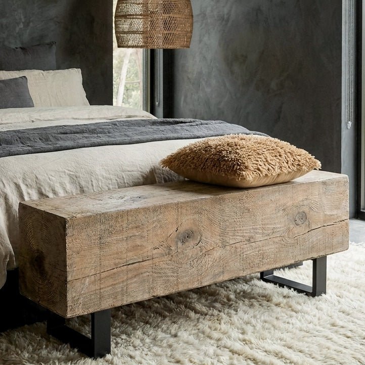 Abigail Ahern Darby Bench with a realistic wood-effect finish and industrial-style black metal legs, styled in a bedroom.