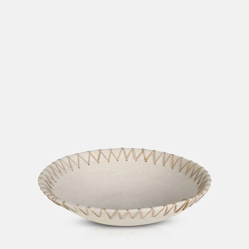 Halstead paper mache decorative bowl with a shallow round shape, off white textured surface and natural coloured cord laced diagonally around the gently raised rim.