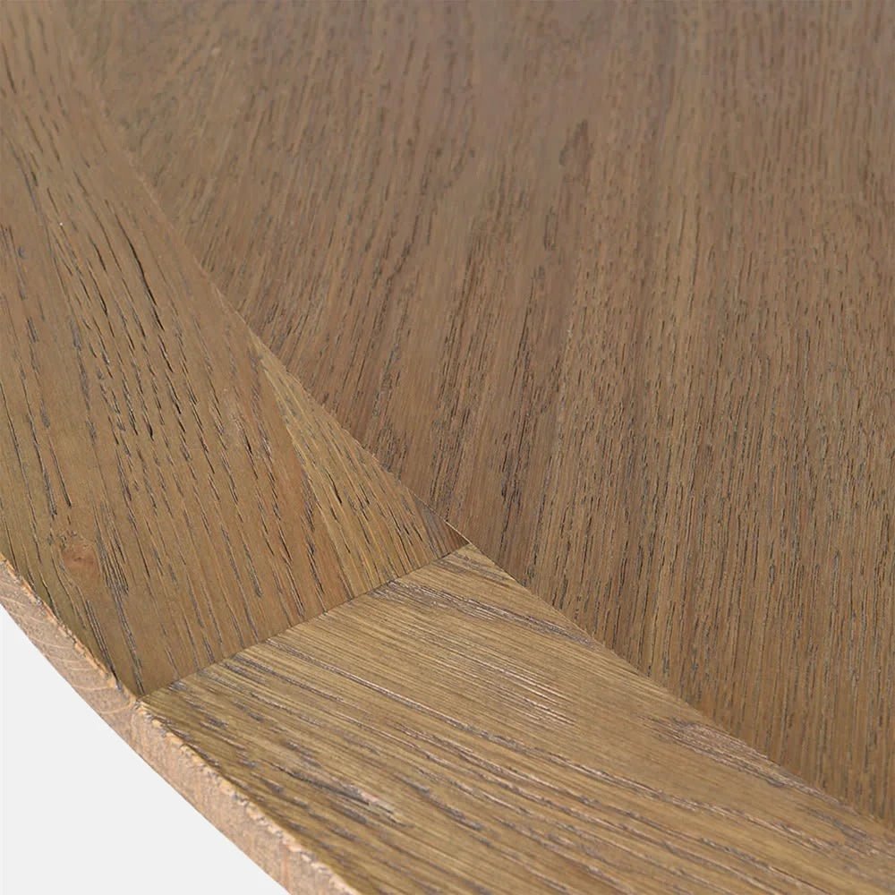 Harrington Wooden Dining Table detail reveals natural grain patterns, joined wood sections and a gently rounded tabletop edge in a warm light brown finish.