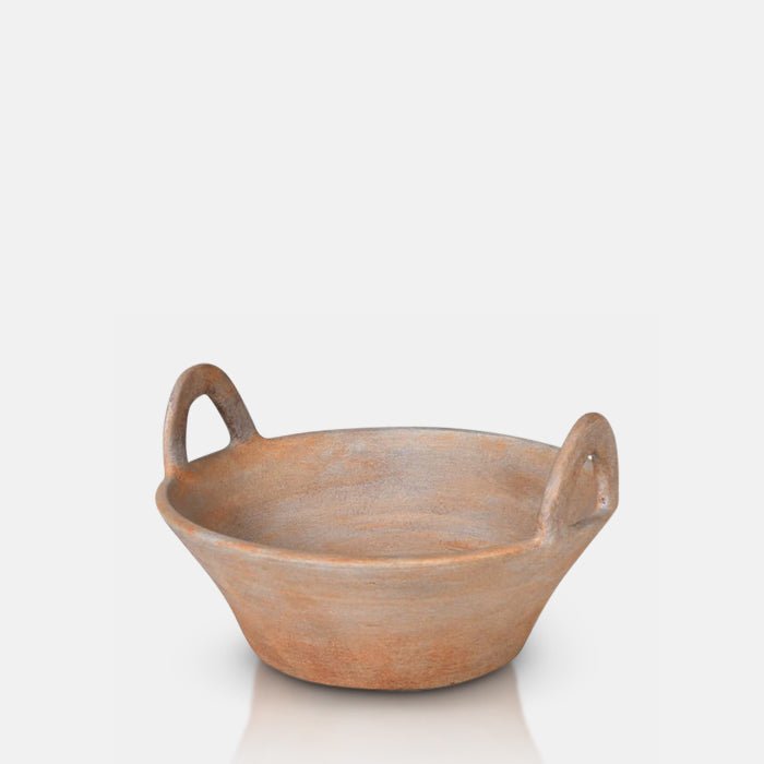 A cutout of the Lucerne Terracotta Bowl. A traditional rustic terracotta bowl with handles.