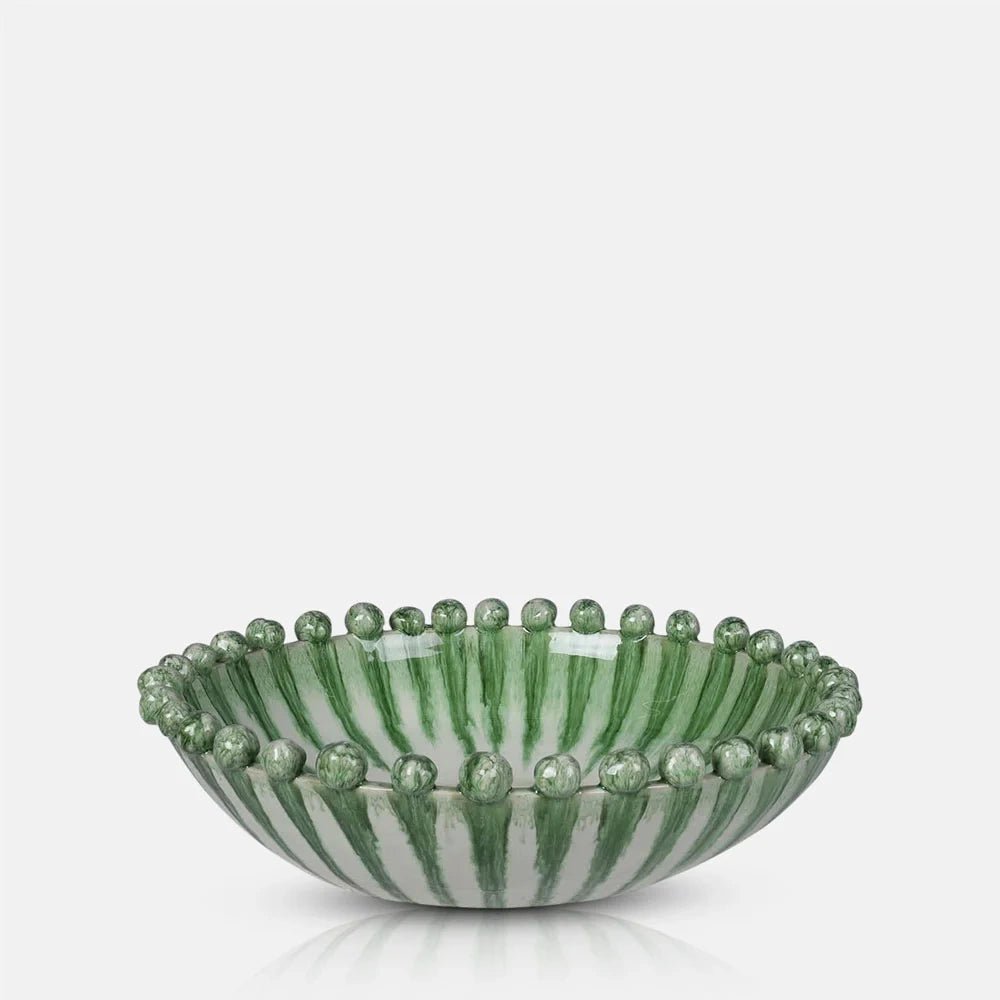 Radcliff bobble decorative bowl shown from a low angle, featuring a shallow rounded profile, green vertical stripes and small rounded details around its rim.