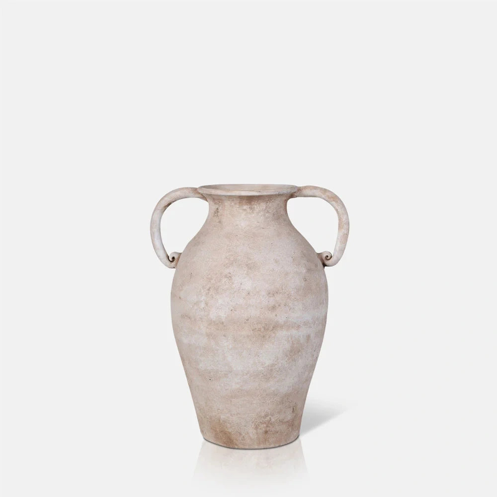 Romella ceramic vase with a tall rounded body, two curled handles, narrow opening and tapered base, finished with mottled cream and beige weathered texture.