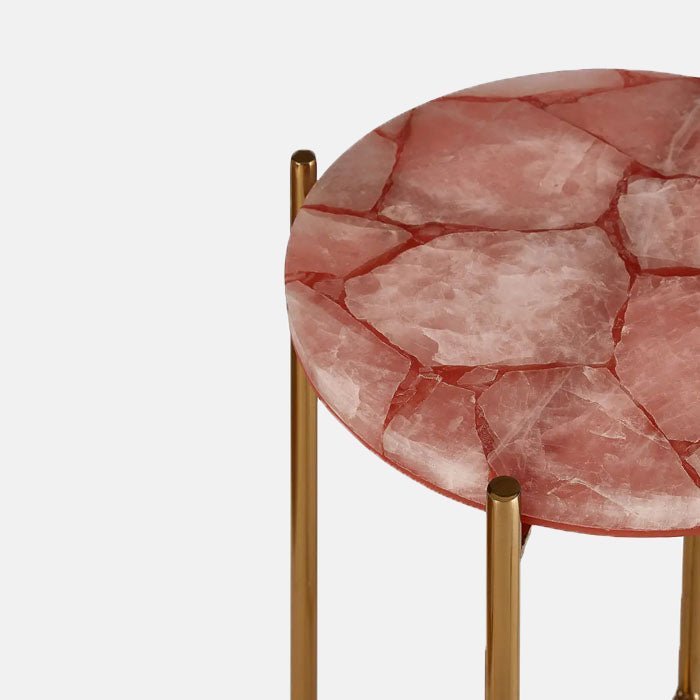 A closeup of the beautiful pinky hued solid natural quartz top of the Sandon Quartz Side Table.