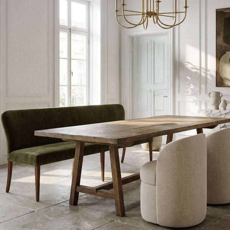 Abigail Ahern Thorne Velvet Dining Bench upholstered in soft, sumptuous velvet with a solid oak wood frame, styled alongside a dining table to create a warm and inviting space for entertaining.