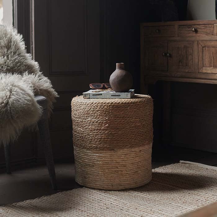 The Hadlow Woven Rope Stool, a cylindrical stool covered in rope in a two tone cream and natural colourway.