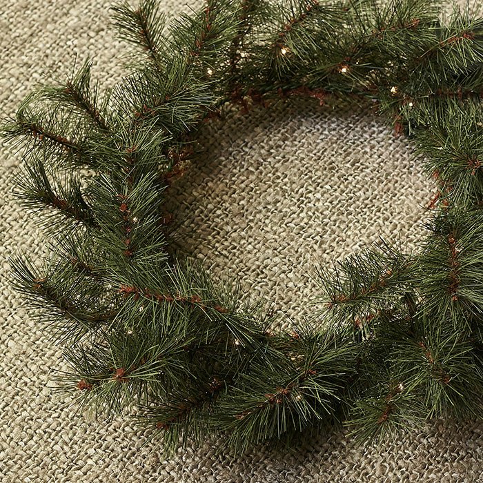 Christmas wreath with subtle twinkling lights.