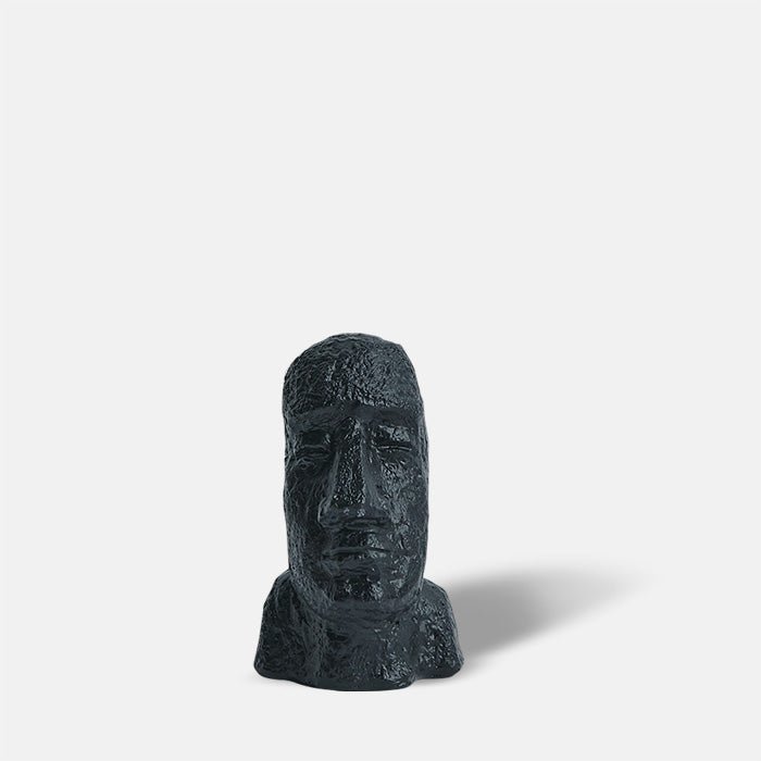 Face sculpture in black with a long face