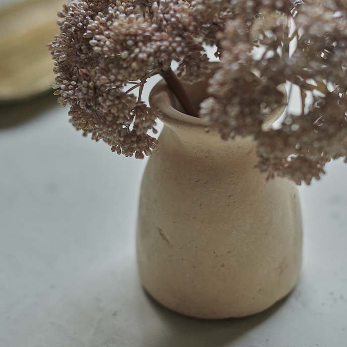 Rustic texture on paper mache bud vase.