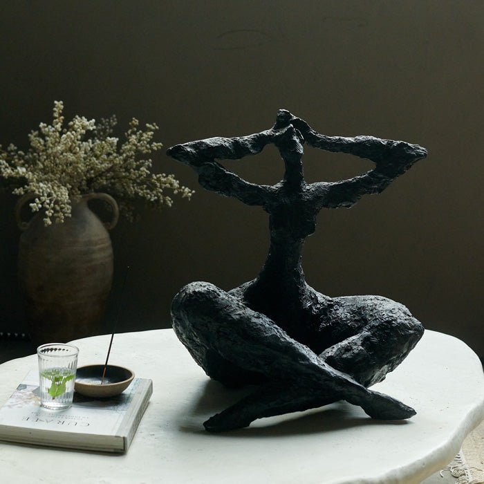 Large seated female figure sculpture, crafted in matte black resin. Cross legged female sculpture in black textured resin, adds an arty style to your home decor.