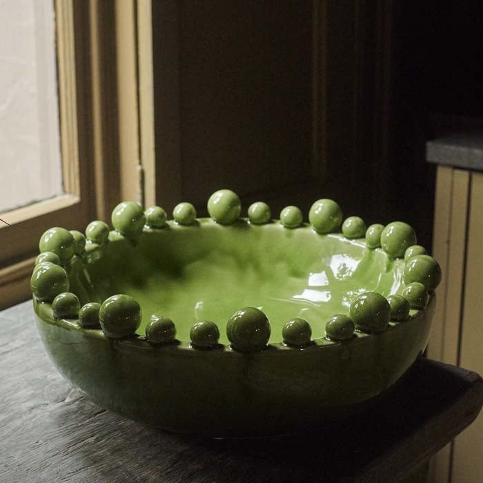 The Bourton Bowl - Green, a large round bowl with a glossy glazed finish and textural bubble top.