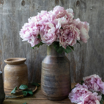 Luxury artificial peony flowers in soft pink. These lifelike flowers are a favourite with florists and flower arranging. Faux peonies add a chic look to any home decor style, and look stunning in a flower arrangement or add a natural garden flowers look to a large vase. Luxury artificial flowers that look lifelike from Abigail Ahern, a trusted interiors brand.