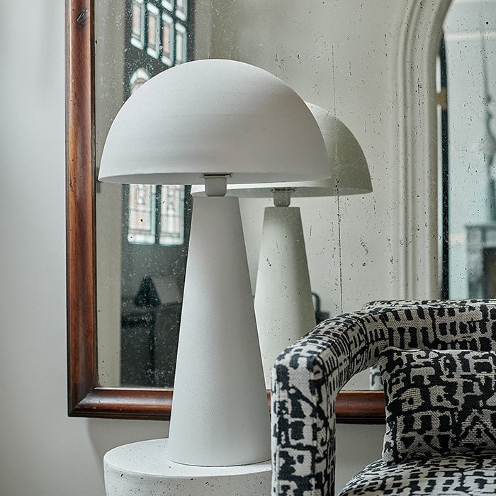 The Danby Dome Lamp next to a large mirror.