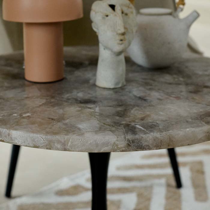 A side view of the luxe monochrome marble top of the Stamford Side Table.