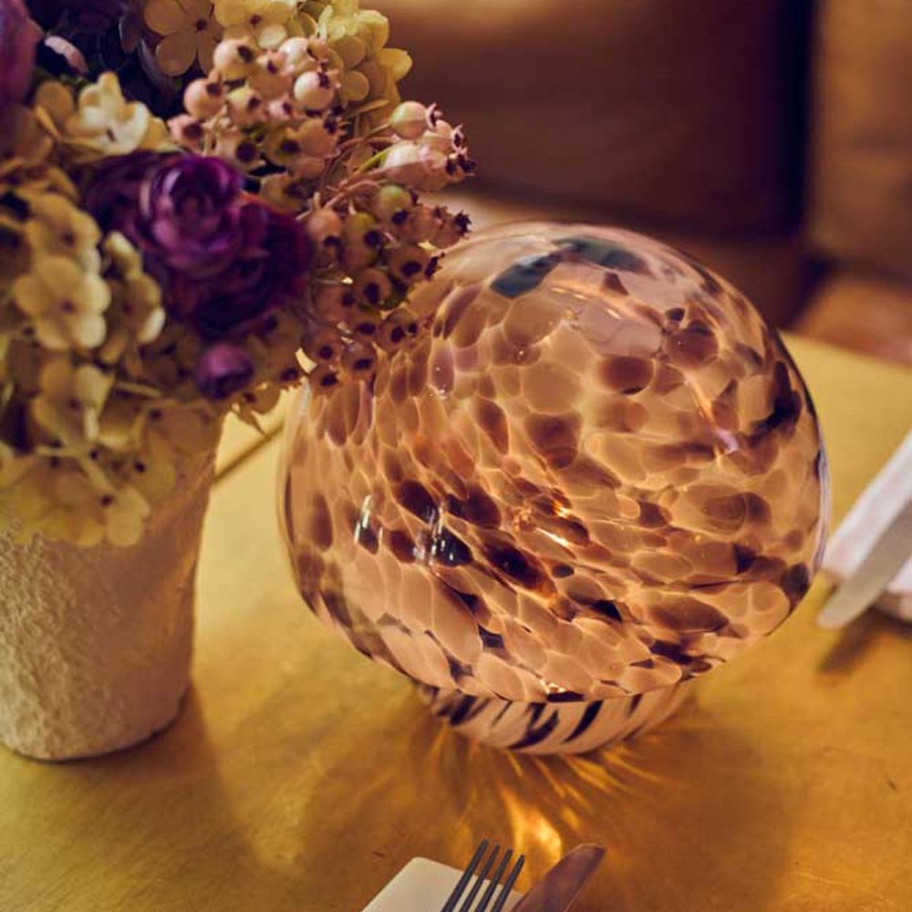 Paloma Portable Table Lamp, Dusk - detail image of the colourful pattern on a glass battery lamp.