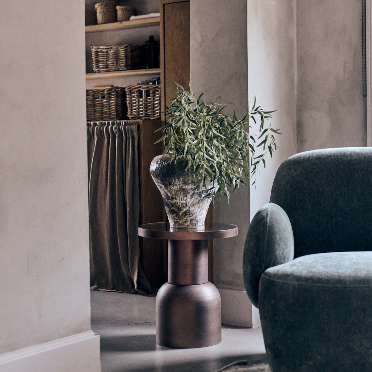 Debden side table round mirror top brass sculptural base modern luxury living room Abigail Ahern