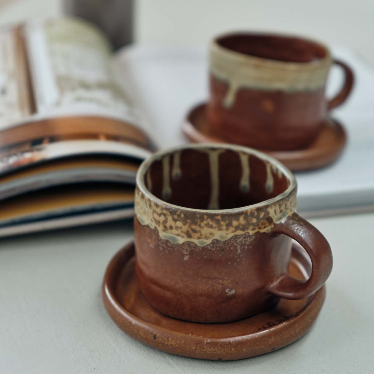 Norman Cup and Saucer, Rust
