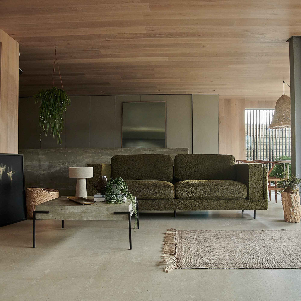 Eartha Boucle Sofa	Eartha boucle sofa olive green two seater boxy modern black metal legs living room furniture