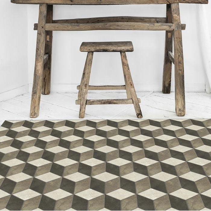 Geometric monochrome pattern on a vinyl rug sat by a wooden desk