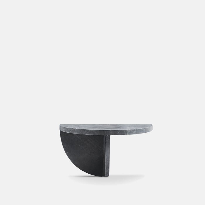 Semi circle shaped black marble shelf