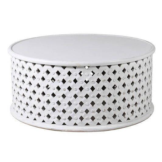 Cutout image of a round, white coffee table with a smooth top, and crossed beams of wood in a circular pattern holding it up. The texture interlocks like a lot of X's and each X has a stud on it. 