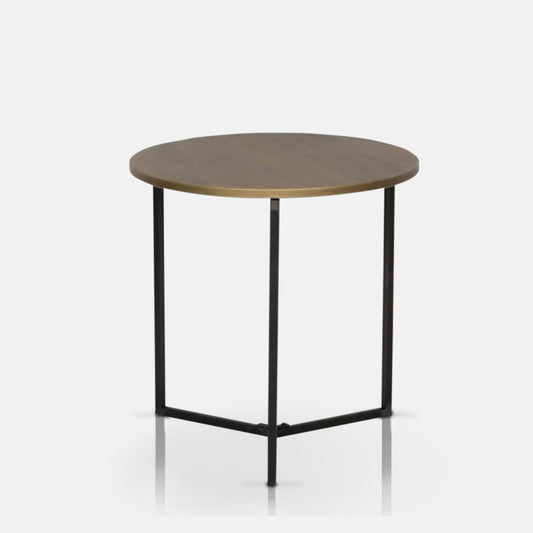 Circular side table made of metal on a white background.